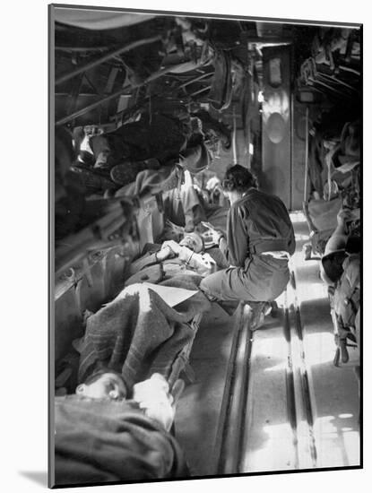 Miss Mary Smith of South Carolina Treating Patients During Flight to North-American Photographer-Mounted Photographic Print