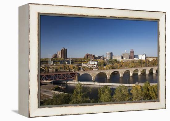 Mississippi River and City Skyline, Minneapolis, Minnesota, USA-Walter Bibikow-Framed Premier Image Canvas