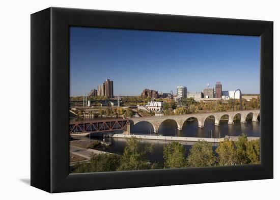 Mississippi River and City Skyline, Minneapolis, Minnesota, USA-Walter Bibikow-Framed Premier Image Canvas