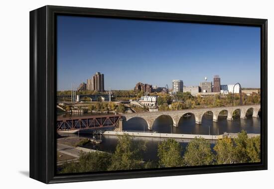 Mississippi River and City Skyline, Minneapolis, Minnesota, USA-Walter Bibikow-Framed Premier Image Canvas