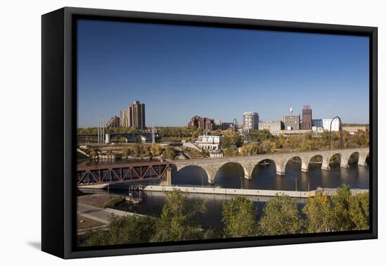 Mississippi River and City Skyline, Minneapolis, Minnesota, USA-Walter Bibikow-Framed Premier Image Canvas
