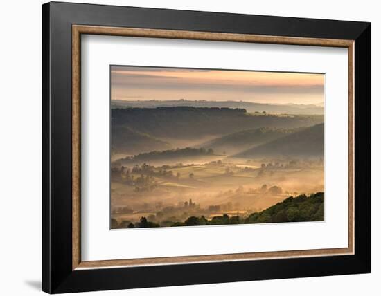 Mist covered rolling countryside at dawn, Dartmoor National Park, Devon, England. Spring (May) 2016-Adam Burton-Framed Photographic Print