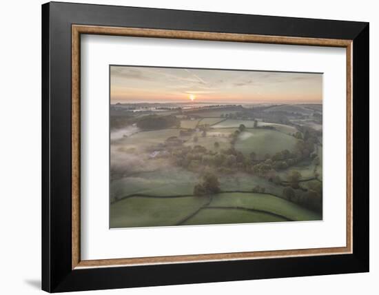 Misty spring sunrise over rolling countryside, South Tawton, Devon, England, United Kingdom, Europe-Adam Burton-Framed Photographic Print