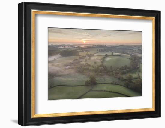 Misty spring sunrise over rolling countryside, South Tawton, Devon, England, United Kingdom, Europe-Adam Burton-Framed Photographic Print