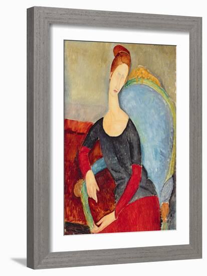 Mme Hebuterne in a Blue Chair, 1918-Amedeo Modigliani-Framed Giclee Print