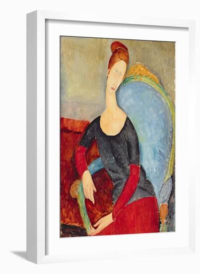 Mme Hebuterne in a Blue Chair, 1918-Amedeo Modigliani-Framed Giclee Print