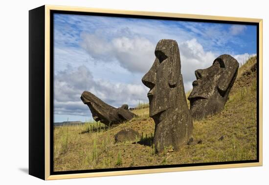 Moai Stone Statue Heads, At The Rapa Nui Quarry, Base Of Rano Raraku Volcano. Easter Island, Chile-Karine Aigner-Framed Premier Image Canvas