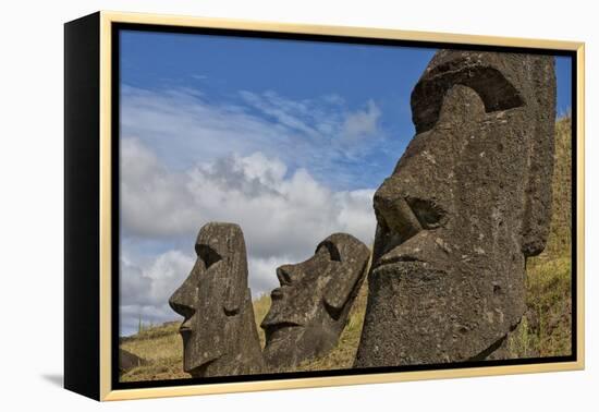 Moai Stone Statue Heads, At The Rapa Nui Quarry, Base Of Rano Raraku Volcano. Easter Island, Chile-Karine Aigner-Framed Premier Image Canvas