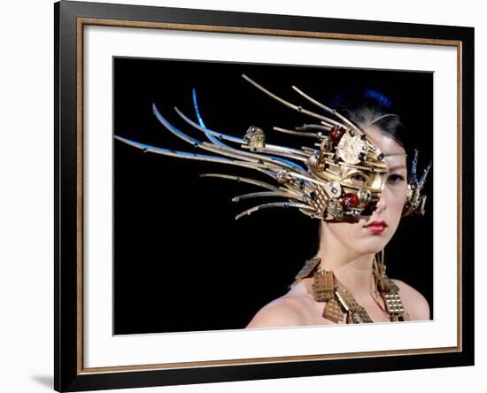 Model Displays a Creation by Pastry Chef Kotatsu Kanda During the Tokyo Sweets Collection 2009-null-Framed Photographic Print