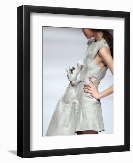 Model Displays a Creation by University Graduates During China Fashion Week in Beijing-null-Framed Photographic Print