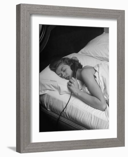 Model Gaby Bouche Talking on the Phone from Her Hotel Room-Nina Leen-Framed Photographic Print