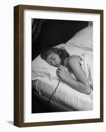 Model Gaby Bouche Talking on the Phone from Her Hotel Room-Nina Leen-Framed Photographic Print