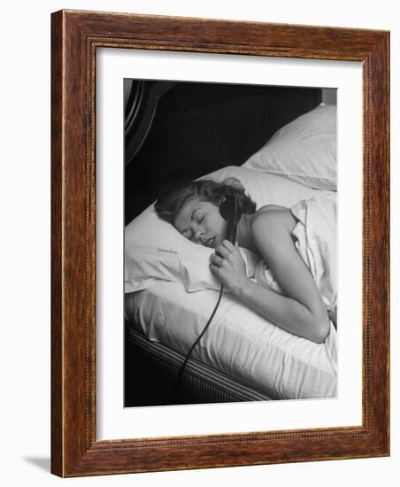 Model Gaby Bouche Talking on the Phone from Her Hotel Room-Nina Leen-Framed Photographic Print