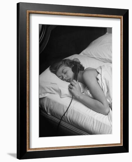 Model Gaby Bouche Talking on the Phone from Her Hotel Room-Nina Leen-Framed Photographic Print