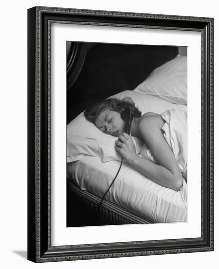 Model Gaby Bouche Talking on the Phone from Her Hotel Room-Nina Leen-Framed Photographic Print