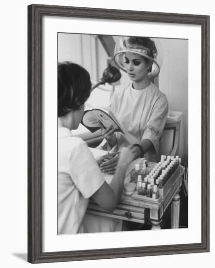 Model Getting a Manicure Prior to the "April in Paris" Charity Ball-Yale Joel-Framed Photographic Print