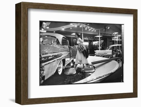 Model Gingerly Traversing Stepping Stones to Get to La Parisienne Pontiac Hard Top Car on Display-Walter Sanders-Framed Photographic Print