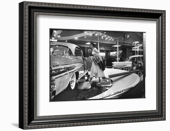 Model Gingerly Traversing Stepping Stones to Get to La Parisienne Pontiac Hard Top Car on Display-Walter Sanders-Framed Photographic Print