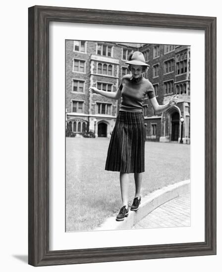 Model in Hat, Sweater and Skirt, Appearing to Balance on Curb, c.1938-Alfred Eisenstaedt-Framed Photographic Print