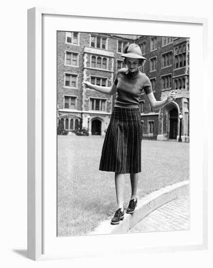 Model in Hat, Sweater and Skirt, Appearing to Balance on Curb, c.1938-Alfred Eisenstaedt-Framed Photographic Print