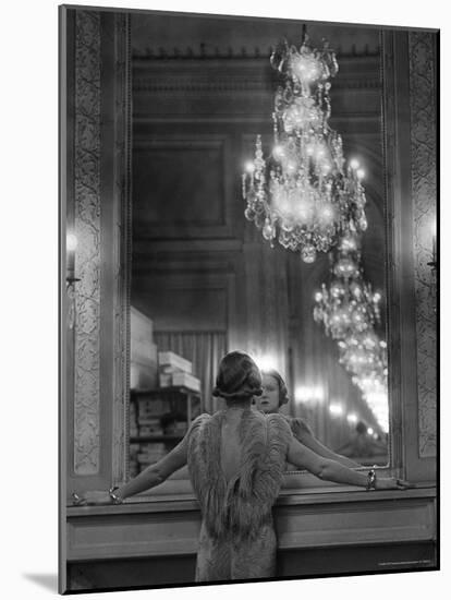 Model in Ostrich Feather Trimmed Gown Pausing to Regard Herself in Grand Mirror of Molyneux Atelier-Alfred Eisenstaedt-Mounted Photographic Print