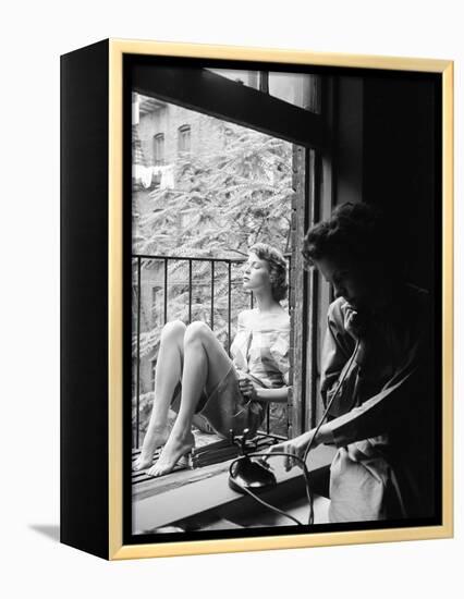 Model Jean Patchet Seated on a Fire Escape, Talks with Eileen Ford, New York, NY, 1948-Nina Leen-Framed Premier Image Canvas