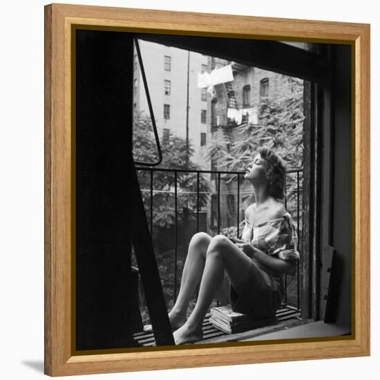 Model Jean Patchett on Fire Escape of Ford Modeling Agency, New York, New York, 1941-Nina Leen-Framed Premier Image Canvas