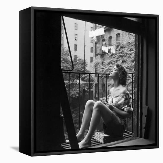 Model Jean Patchett on Fire Escape of Ford Modeling Agency, New York, New York, 1941-Nina Leen-Framed Premier Image Canvas