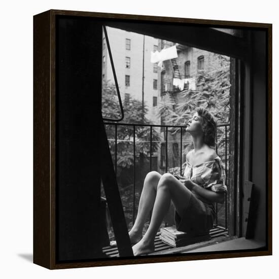 Model Jean Patchett on Fire Escape of Ford Modeling Agency, New York, New York, 1941-Nina Leen-Framed Premier Image Canvas