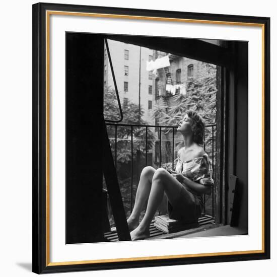 Model Jean Patchett on Fire Escape of Ford Modeling Agency, New York, New York, 1941-Nina Leen-Framed Premium Photographic Print