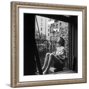Model Jean Patchett on Fire Escape of Ford Modeling Agency, New York, New York, 1941-Nina Leen-Framed Photographic Print