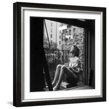 Model Jean Patchett on Fire Escape of Ford Modeling Agency, New York, New York, 1941-Nina Leen-Framed Photographic Print