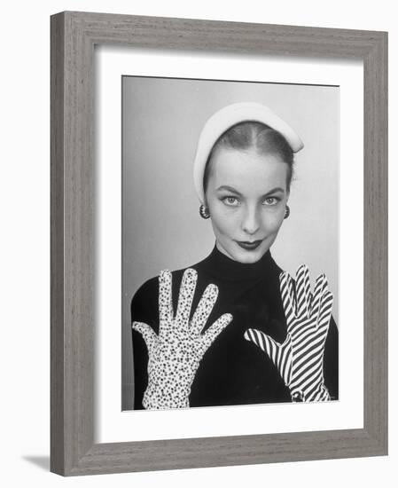 Model Martha Boss, Modeling Mismatched Gloves-Nina Leen-Framed Photographic Print