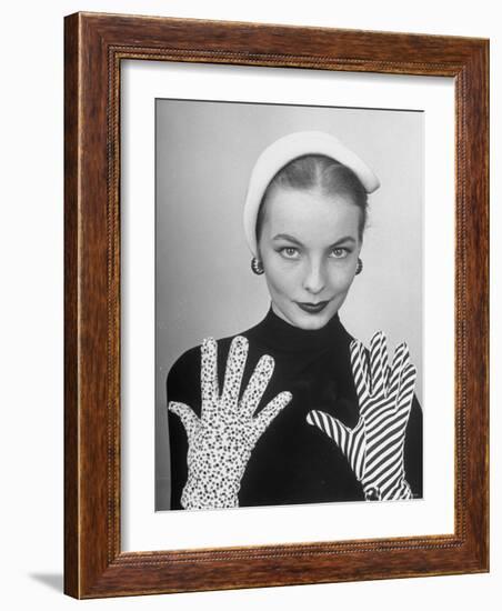 Model Martha Boss, Modeling Mismatched Gloves-Nina Leen-Framed Photographic Print