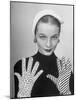 Model Martha Boss, Modeling Mismatched Gloves-Nina Leen-Mounted Photographic Print