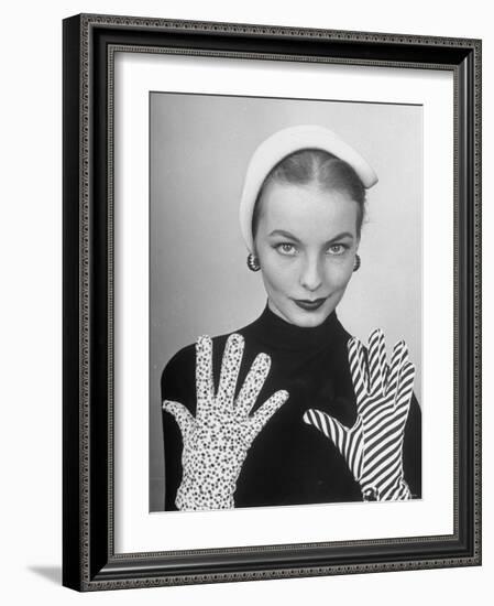 Model Martha Boss, Modeling Mismatched Gloves-Nina Leen-Framed Photographic Print