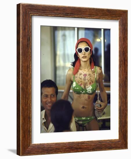 Model Naty Abascal Wearing Bikini, Showing Off Designs on Chest and Stomach at Paradise Islands-Bill Eppridge-Framed Photographic Print