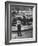 Model Posing Beside Cadillac Eldorado Captures Attention of Young Boy at National Automobile Show-Walter Sanders-Framed Photographic Print