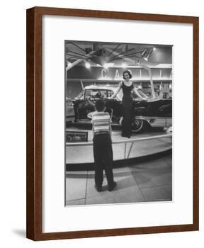 Model Posing Beside Cadillac Eldorado Captures Attention of Young Boy at National Automobile Show-Walter Sanders-Framed Photographic Print