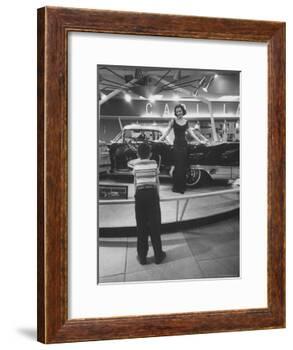 Model Posing Beside Cadillac Eldorado Captures Attention of Young Boy at National Automobile Show-Walter Sanders-Framed Photographic Print