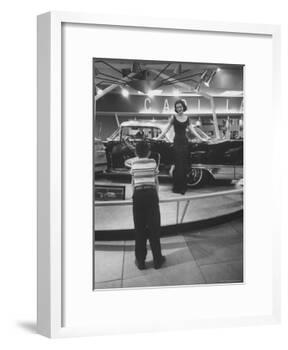 Model Posing Beside Cadillac Eldorado Captures Attention of Young Boy at National Automobile Show-Walter Sanders-Framed Photographic Print