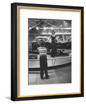 Model Posing Beside Cadillac Eldorado Captures Attention of Young Boy at National Automobile Show-Walter Sanders-Framed Photographic Print