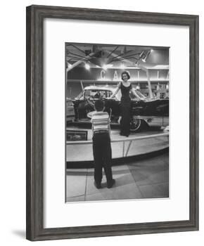 Model Posing Beside Cadillac Eldorado Captures Attention of Young Boy at National Automobile Show-Walter Sanders-Framed Photographic Print
