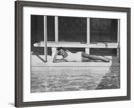 Model Posing Near a Pool-Allan Grant-Framed Photographic Print