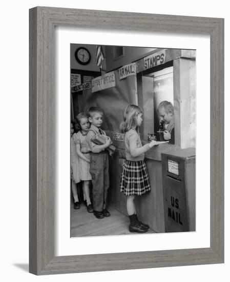 Model Post Office a Teacher Set Up in the Classroom for the Children to Learn About the Mail System-Nina Leen-Framed Photographic Print