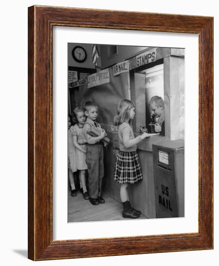 Model Post Office a Teacher Set Up in the Classroom for the Children to Learn About the Mail System-Nina Leen-Framed Photographic Print