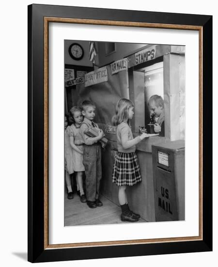 Model Post Office a Teacher Set Up in the Classroom for the Children to Learn About the Mail System-Nina Leen-Framed Photographic Print