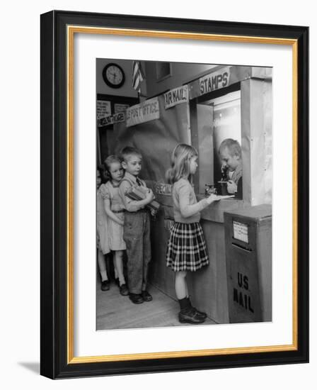 Model Post Office a Teacher Set Up in the Classroom for the Children to Learn About the Mail System-Nina Leen-Framed Photographic Print