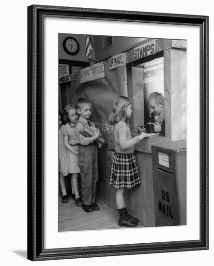 Model Post Office a Teacher Set Up in the Classroom for the Children to Learn About the Mail System-Nina Leen-Framed Photographic Print
