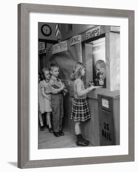 Model Post Office a Teacher Set Up in the Classroom for the Children to Learn About the Mail System-Nina Leen-Framed Photographic Print